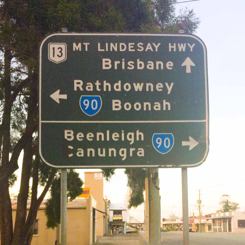 Road sign depicting directions on the way in to Beaudesert via the Kerry Road